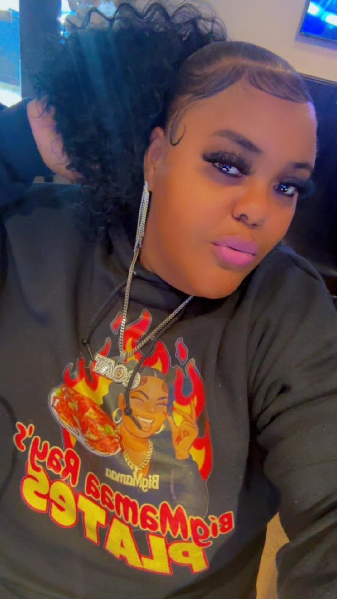 Big Mama Ray wearing her Big Mama Ray's Plates hoodie